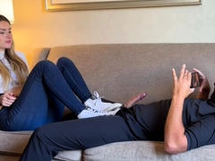 Foot mistress edging masked slave's cock in femdom session